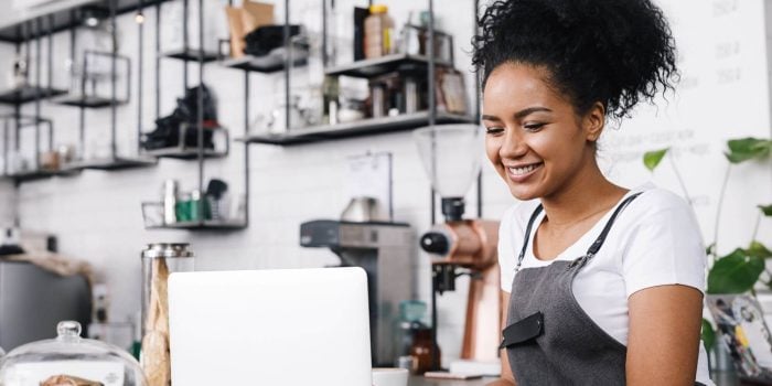A young man sitting at a table