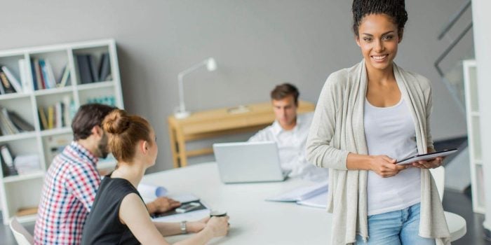 A group of people sitting at a table